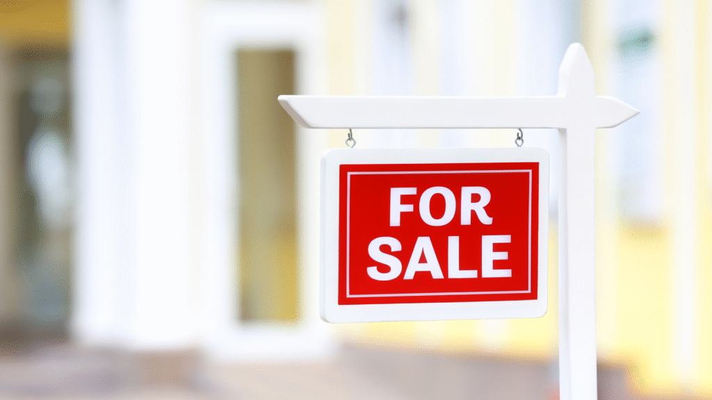 For Sale sign outside a modern property